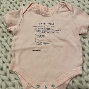 Onesie coloring is off in pic.  More of a pink